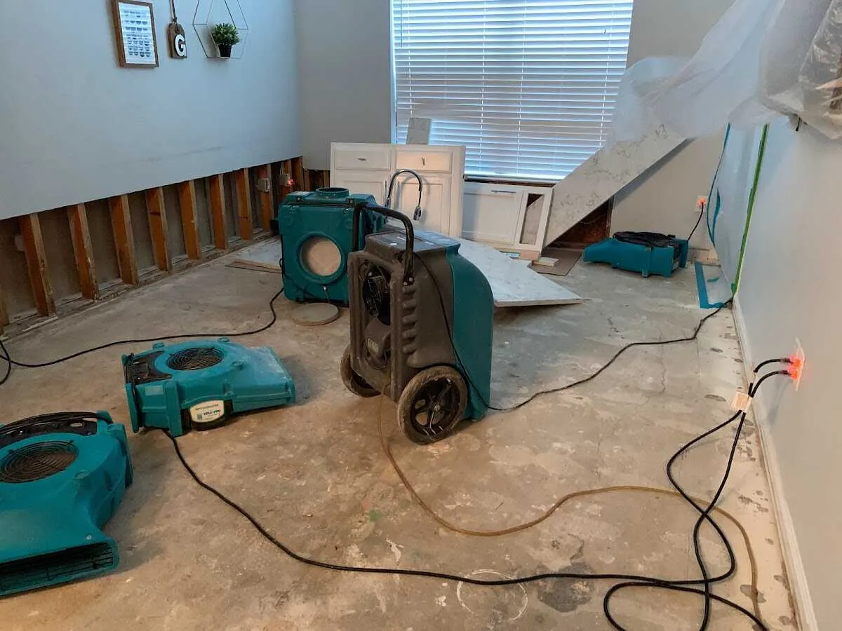 Dehumidifier in flood-cut room for Water Damage Restoration in Lake Zurich